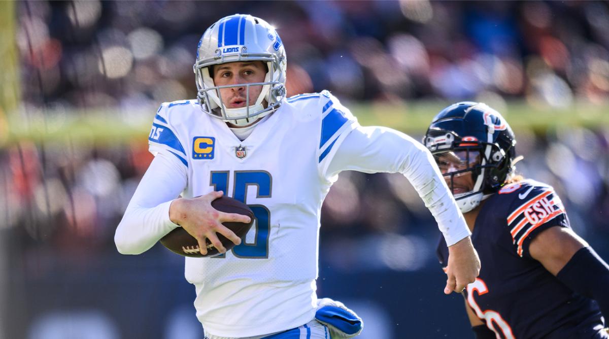Nov 13, 2022; Chicago, Illinois, USA; Detroit Lions quarterback Jared Goff (16) runs the ball in the fourth quarter against the Chicago Bears at Soldier Field.